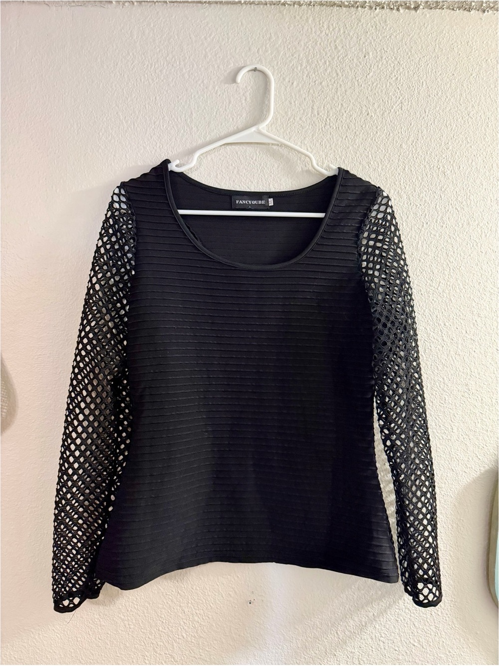 black top with mesh sleeves
